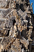 Elaborate figures carved in stucco decorate the ancient stupas, Kakku Buddhist Ruins. Shan State in Myanmar (Burma). 